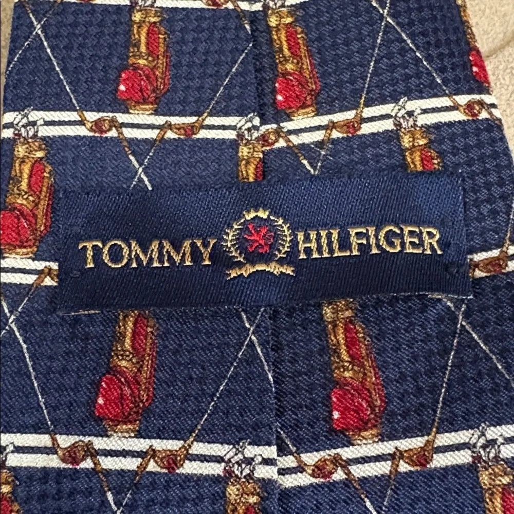 Tommy Hilfiger 100% imported silk tie with golf clubs and stars